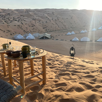 'Magic Arabia' – Wüstencamp: Blick von der Düne zum Sonnenuntergang